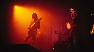 COLSTON HALL Photo of GENESIS and Peter GABRIEL and Steve HACKETT, Steve Hackett and Peter Gabriel performing live onstage in 1974